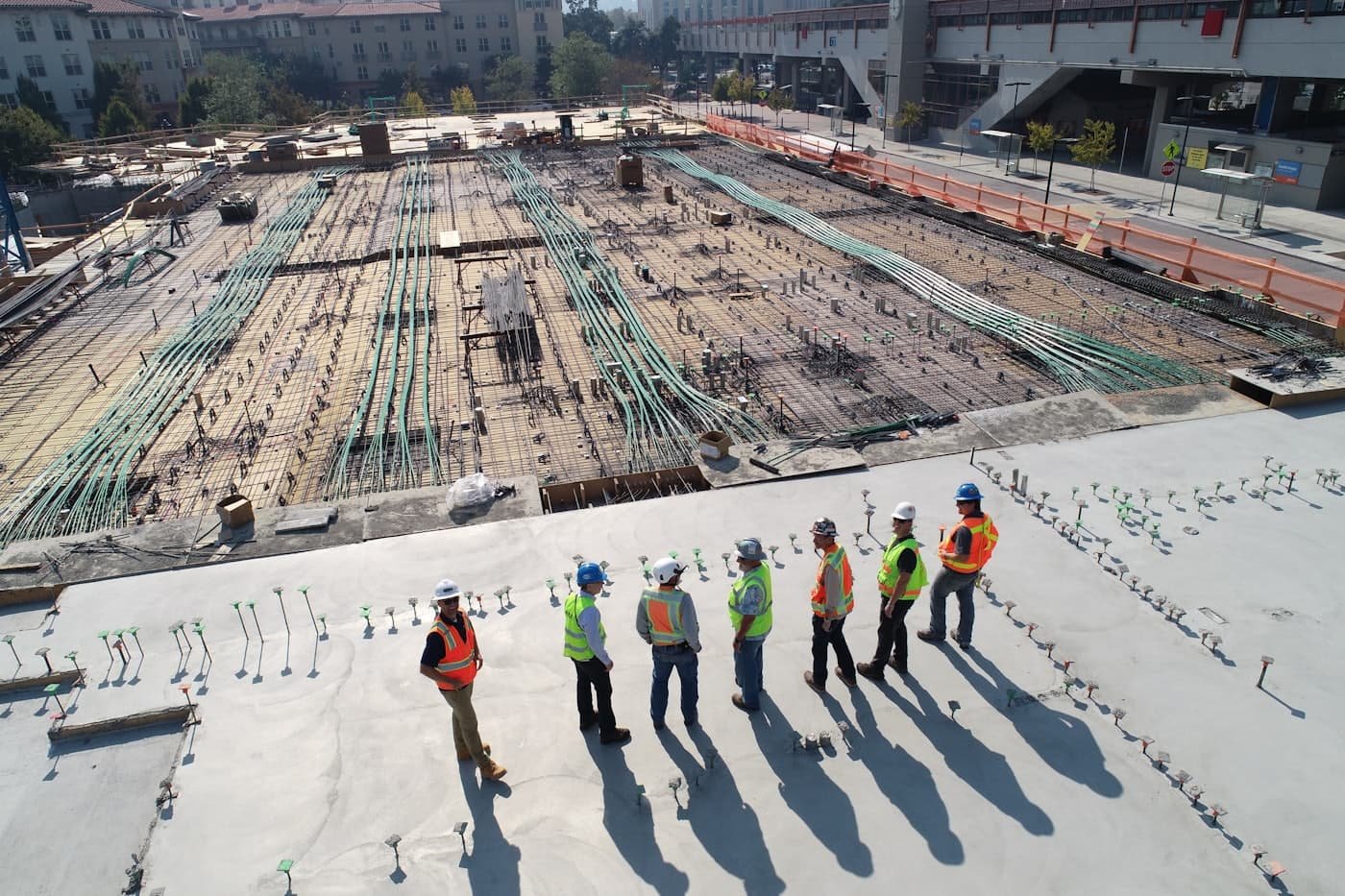 An installation crew working across a large flat roof